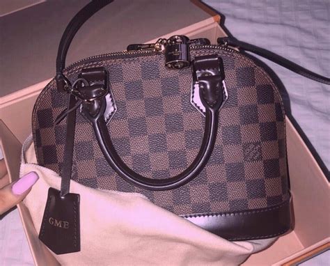 lv borsa alma falso|false louis vuitton alma bags.